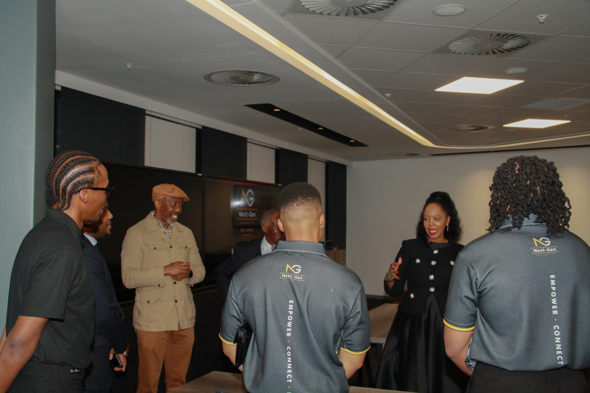 Guests and members in conversation after the session